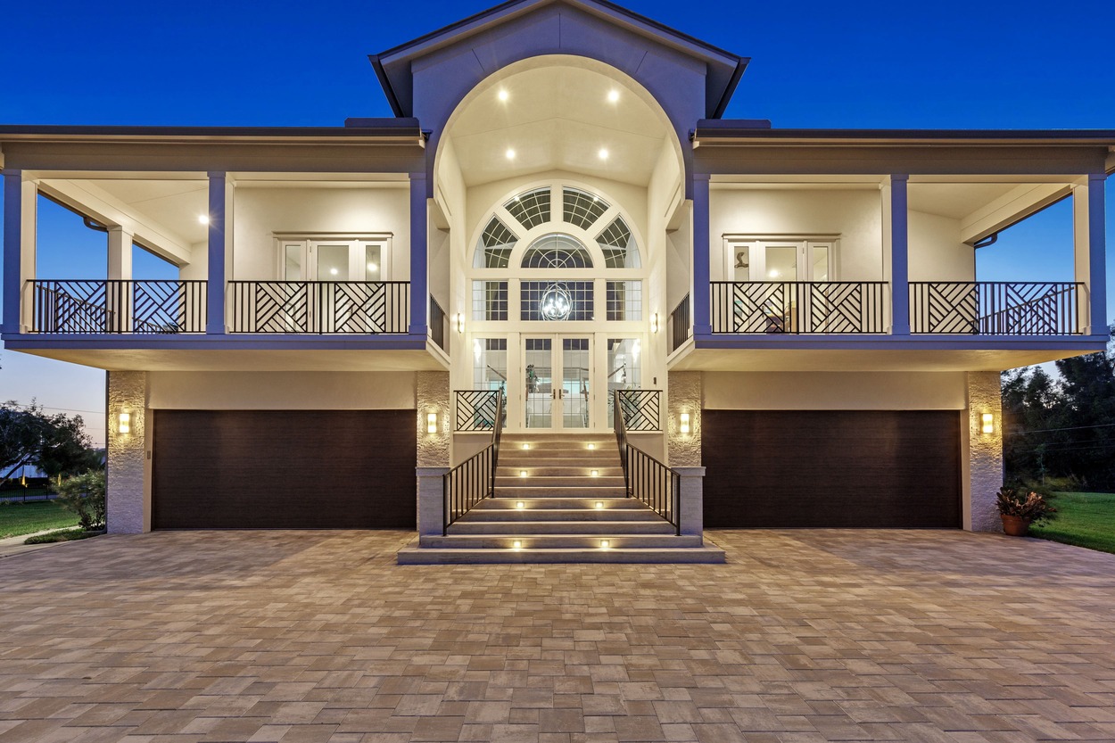 Aerial front exterior view of a custom home by J.F. Smith Building Contractors, Lee County FL